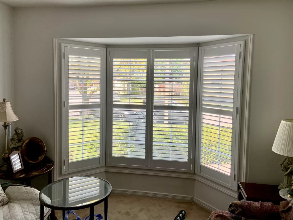 Bay window with PVC california shutters by ShutterLux Scarborough